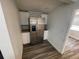 Pantry includes stainless steel refrigerator and freezer with a wooden countertop at 645 38Th S Ave, St Petersburg, FL 33705