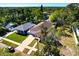 Aerial view shows lawns, driveway, white fence and the houses close to each other at 860 17Th S Ave, St Petersburg, FL 33701