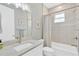 Bright bathroom featuring a modern vanity with a sink and a bathtub-shower combination at 860 17Th S Ave, St Petersburg, FL 33701