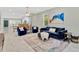 Open concept living room and dining area with marble floors, modern furnishings and decor at 860 17Th S Ave, St Petersburg, FL 33701