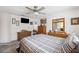 Spacious bedroom with furnishings and a calming, neutral palette at 8621 Bridgewater Dr, New Port Richey, FL 34655