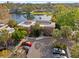 Aerial view of the property showcasing lush landscaping, building exteriors, and ample parking at 10423 Carrollbrook Cir # 102, Tampa, FL 33618