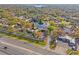 Beautiful aerial shot of the property with views of the serene lake and nearby community at 10423 Carrollbrook Cir # 102, Tampa, FL 33618