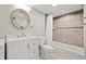 Well-lit bathroom with combo shower and neutral paint at 10423 Carrollbrook Cir # 102, Tampa, FL 33618