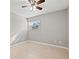 Inviting bedroom with tile flooring, neutral paint and natural light at 10423 Carrollbrook Cir # 102, Tampa, FL 33618