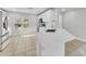 Modern kitchen with a breakfast bar, stainless steel appliances and stylish finishes at 10906 Johanna Ave, Riverview, FL 33578