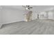 Bright living room featuring modern floors and a staircase at 10906 Johanna Ave, Riverview, FL 33578
