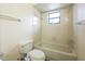 Bathroom featuring a standard tub/shower combination and essential fixtures for a functional layout at 1232 Persimmon Dr, Holiday, FL 34691