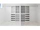 Walk-in closet featuring custom shelving and drawers, with a marble floor at 1239 36Th N Ave, St Petersburg, FL 33704