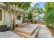 Multi-level deck and landscaped backyard provide ample space for outdoor enjoyment at 129 18Th N Ave, St Petersburg, FL 33704