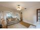 Bright living room featuring hardwood floors and neutral colored walls with an area rug at 129 18Th N Ave, St Petersburg, FL 33704