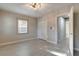 Cozy bedroom with ample closet space, neutral walls, and contemporary ceiling light fixture at 1310 E 18Th Ave, Tampa, FL 33605