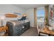 Stylized ' bedroom with creative decor, desk, and a playful, beachy vibe at 15120 Cuzcorro Ct, Nokomis, FL 34275