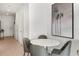 Cozy dining room area with a modern table, comfortable seating, and stylish decor at 15120 Cuzcorro Ct, Nokomis, FL 34275