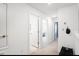 Upstairs hallway featuring carpet flooring and white walls to adjacent bedrooms at 15120 Cuzcorro Ct, Nokomis, FL 34275