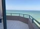 Balcony with ocean view and blue railings in a condo at 1520 Gulf Blvd # Ph2, Clearwater Beach, FL 33767