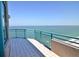 Private balcony with sweeping views of the ocean and coastline at 1520 Gulf Blvd # Ph2, Clearwater Beach, FL 33767