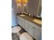 Bathroom features a double sink vanity, and elegant countertops at 1520 Gulf Blvd # Ph2, Clearwater Beach, FL 33767