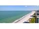 Scenic beach view of the ocean coastline with surrounding city buildings at 1520 Gulf Blvd # Ph2, Clearwater Beach, FL 33767