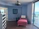 Bright bedroom area with ocean views and a comfy chaise lounge for relaxing at 1520 Gulf Blvd # Ph2, Clearwater Beach, FL 33767