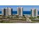 Luxury condo buildings with tropical landscaping, pools, and tennis courts near the beach at 1520 Gulf Blvd # Ph2, Clearwater Beach, FL 33767