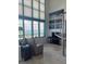 Stylish living room with large windows, offering breathtaking water views and modern design at 1520 Gulf Blvd # Ph2, Clearwater Beach, FL 33767