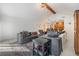 Spacious living room with a vaulted ceiling, an open floor plan, and neutral tile flooring at 1905 Dove Field Pl, Brandon, FL 33510