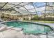 Inviting screened-in pool area with lounging space; perfect for relaxation and entertainment at 1905 Dove Field Pl, Brandon, FL 33510