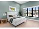 Calming bedroom with a minimalist aesthetic, bright accents, and natural light at 1906 Carolina Ne Ave, St Petersburg, FL 33703