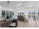 Contemporary dressing room featuring vanity, closets, island dresser and water views at 1906 Carolina Ne Ave, St Petersburg, FL 33703