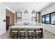 Bright, modern kitchen with island seating, stainless appliances, and sleek countertops at 1906 Carolina Ne Ave, St Petersburg, FL 33703