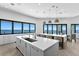 Spacious kitchen featuring an island, ocean views, and an adjacent dining area at 1906 Carolina Ne Ave, St Petersburg, FL 33703