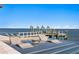 Stunning infinity pool with in-water loungers overlooking the ocean and private dock at 1906 Carolina Ne Ave, St Petersburg, FL 33703