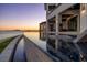 Modern infinity pool with tranquil water features offers a stunning view of the bay at 1906 Carolina Ne Ave, St Petersburg, FL 33703