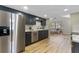 Modern kitchen featuring stainless steel appliances and sleek, dark cabinetry at 1941 48Th S St, St Petersburg, FL 33711