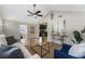 Inviting living room with hardwood flooring, vaulted ceilings, and stylish decor at 1941 48Th S St, St Petersburg, FL 33711