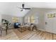 Bright living room featuring hardwood floors and a comfortable seating area at 1941 48Th S St, St Petersburg, FL 33711