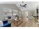 Cozy living space with natural light, hardwood floors, and vaulted ceilings at 1941 48Th S St, St Petersburg, FL 33711
