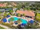 Aerial view of pool, clubhouse, tennis courts, and residential area shows the complete community at 20173 Umbria Hill Dr, Tampa, FL 33647