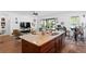 Well-lit kitchen with a large island, stainless steel appliances, and open layout at 20173 Umbria Hill Dr, Tampa, FL 33647