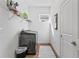 Functional laundry room with modern appliances, storage shelves, and a clean, organized space at 20173 Umbria Hill Dr, Tampa, FL 33647