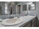 Bathroom features a spacious double sink vanity and is accessible to the other rooms at 20319 Starfinder Way, Tampa, FL 33647