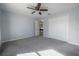Empty bedroom featuring a closet and fan, neutrally decorated in a calm color at 20319 Starfinder Way, Tampa, FL 33647