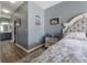 Comfortable bedroom features a plush bed, soft rug, and ensuite bathroom for added convenience at 20319 Starfinder Way, Tampa, FL 33647
