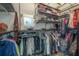 Organized walk-in closet with shelving, hanging rods and plenty of storage space at 20319 Starfinder Way, Tampa, FL 33647