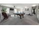 Game room featuring a pool table, ceiling fan, and plush carpeting providing an inviting space for recreation at 20319 Starfinder Way, Tampa, FL 33647