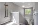 The staircase features a window, and a decorative spot for billiard cues at 20319 Starfinder Way, Tampa, FL 33647