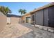 Private backyard featuring a screened lanai, neutral-colored exterior, and palm trees at 2260 Oak Neck Rd # B, Clearwater, FL 33763