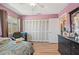 Bedroom boasts ample closet space, laminated floors, and plenty of natural light at 2260 Oak Neck Rd # B, Clearwater, FL 33763