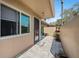 Charming condo entrance with stone pavers, a secure screen door, and well-tended potted plants at 2260 Oak Neck Rd # B, Clearwater, FL 33763